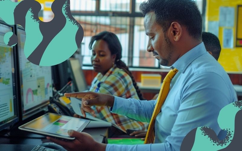 school administrators monitoring School transport routes on a tablet